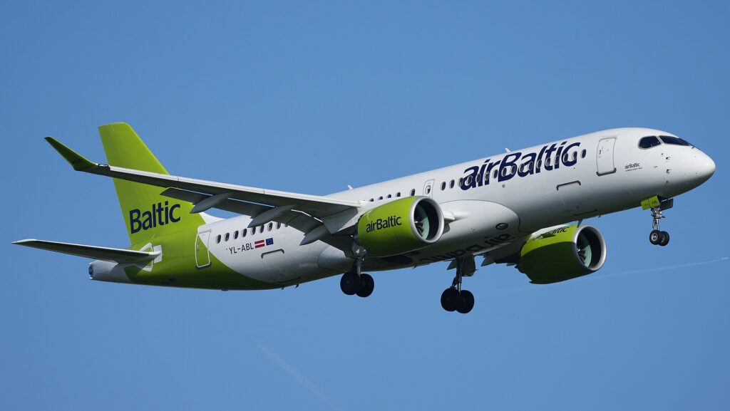 airBaltic Airbus A220-300 on approach with its landing gear down