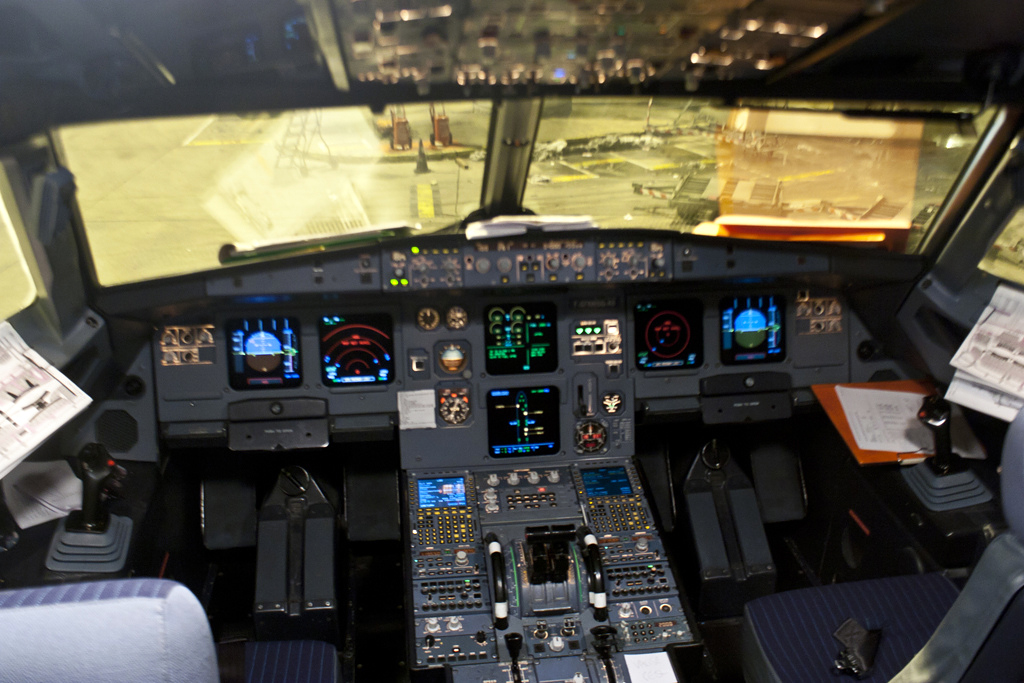 Airbus A320 flight deck with a sidestick controller beside each pilot seat