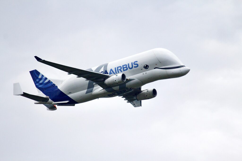 Airbus BelugaXL F-WBXL, a whale-shaped cargo plane with a bulging upper fuselage, in flight