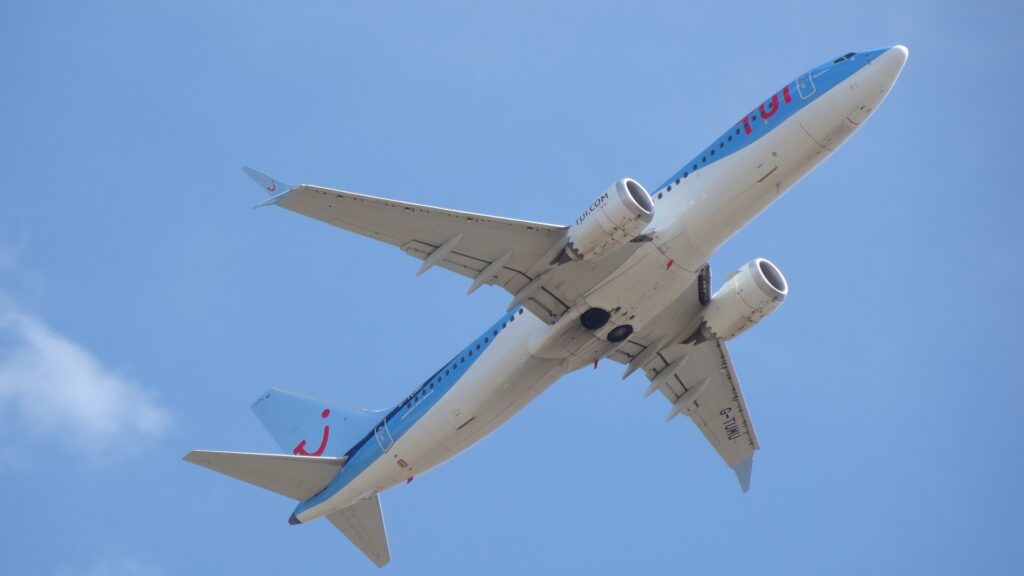TUI Airways Boeing 737-8 MAX seen from below after take-off