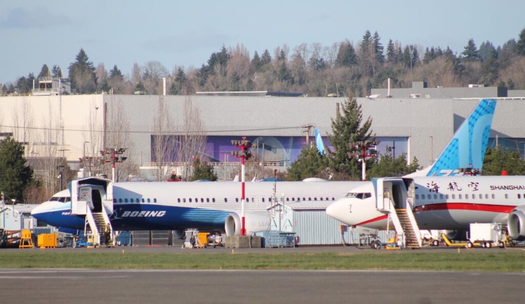 The first Boeing 737 MAX 10 in Boeing house colours parked at Renton next to another 737 MAX