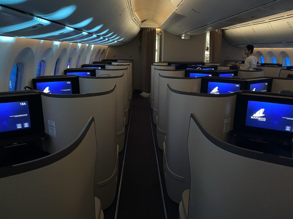 Business class cabin of a Boeing 787-9 with individual seat pods