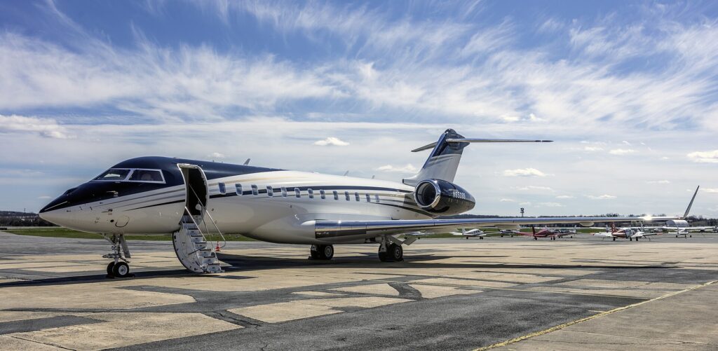 Bombardier Global 6500 N650SS parked on the apron with its airstair door open