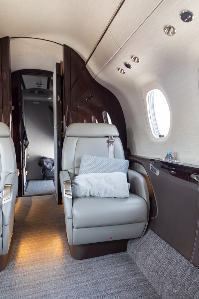 Cream leather passenger seat inside a Cessna Citation Latitude cabin