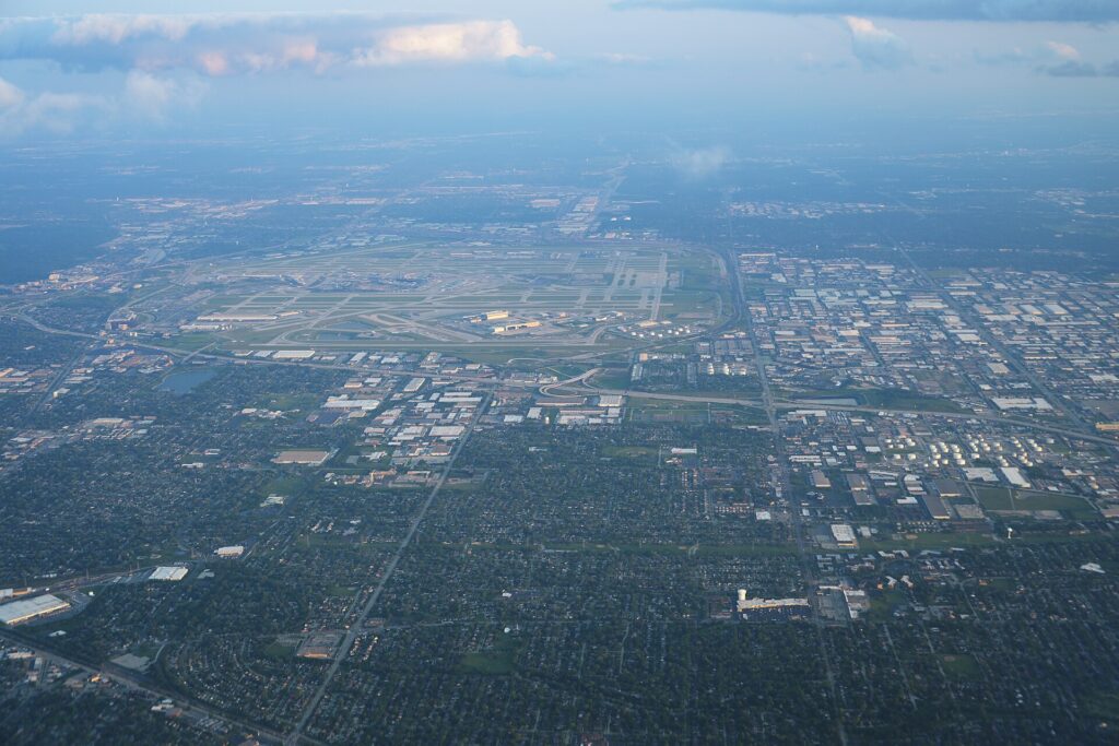 Aerial view of Chicago O'Hare International Airport and the surrounding city seen from an airliner