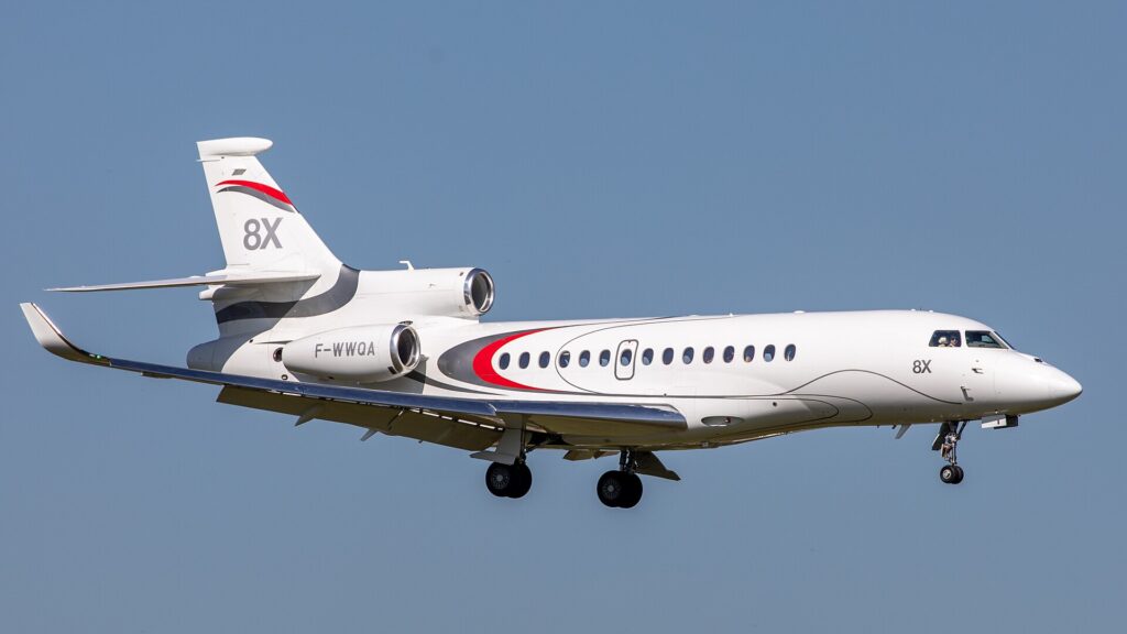 Dassault Falcon 8X with three rear engines flying with its landing gear down
