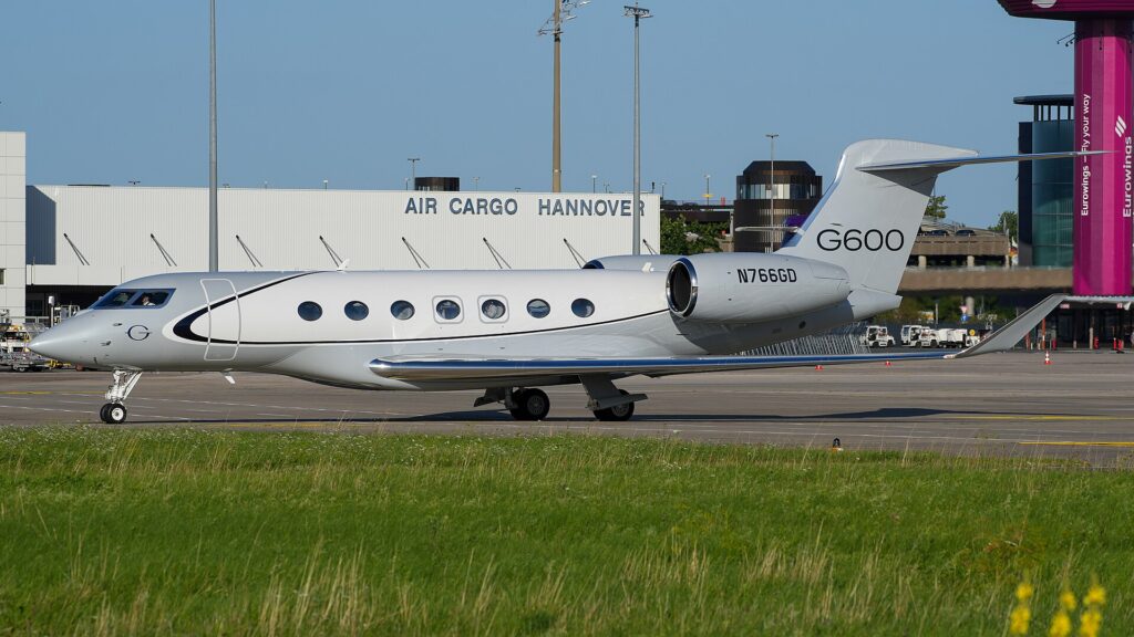Gulfstream G600 N766GD taxiing at Hannover Airport with G600 on its tail