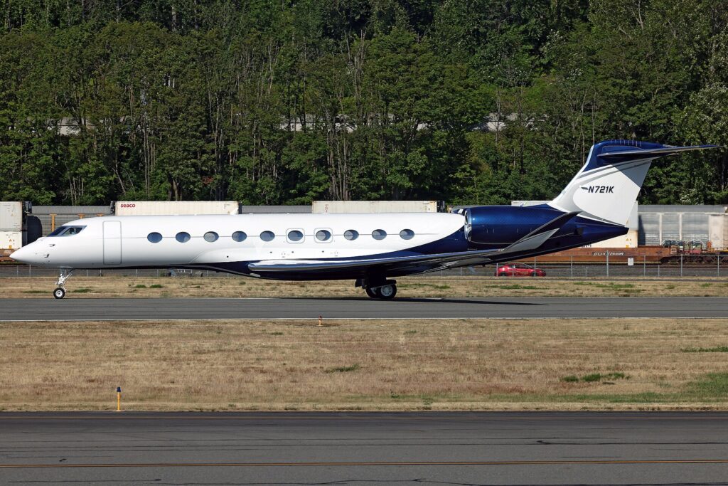 Gulfstream G700 N721K with a dark blue tail taxiing at Boeing Field, Seattle