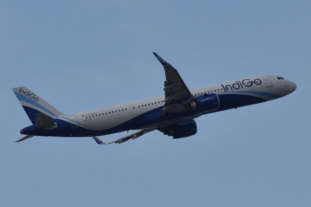 IndiGo Airbus A321XLR registration VT-NLA in flight against a blue sky