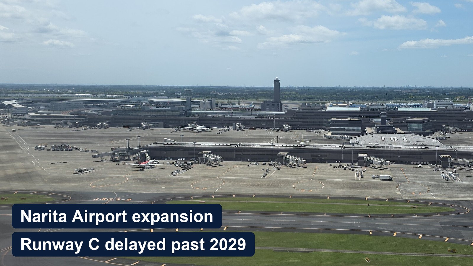 Aerial view of Narita International Airport terminals and taxiways, with the words Narita Airport expansion, Runway C delayed past 2029
