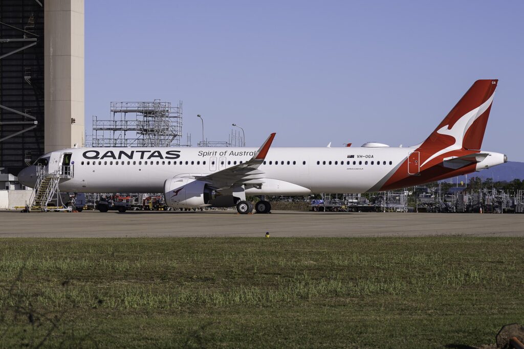 Qantas Airbus A321XLR registration VH-OGA parked on the apron